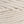 Detailed view of undyed cotton macrame cord twisted structure